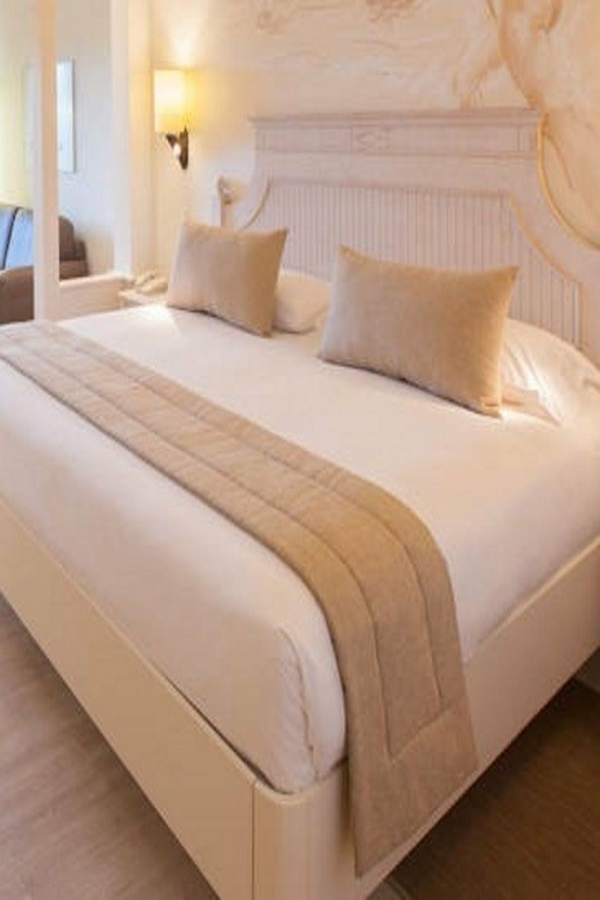 Lopesan Villa Del Conde Resort & Thalasso Мелонерас Экстерьер фото A bed runner